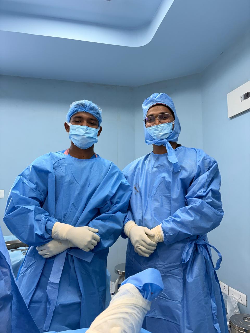 Expert orthopedic specialists and surgical team members in Malda